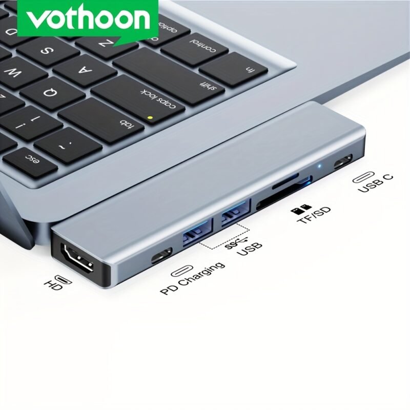 Multiport Adapter with 7 Ports Including USB-A 3.0, USB-C Data Port, 4K HDTV Output, Microsd And SD Card Reader, And 87W Power Delivery for Macbook Pro.